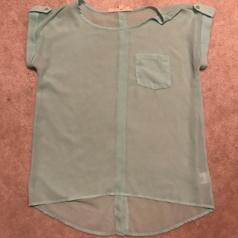 Sheer top with a button down back